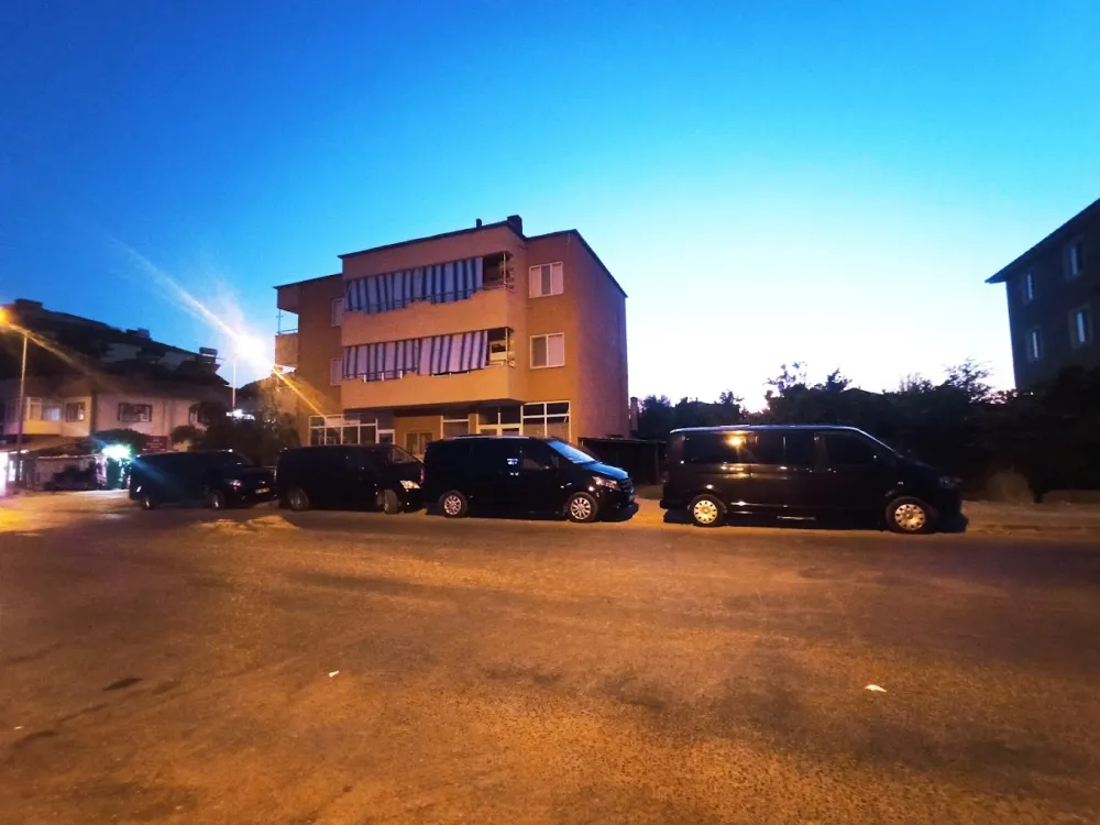  VIP transfer vehicle fleet parked on the streets of Marmaris at sunset - group transportation and urban transportation 